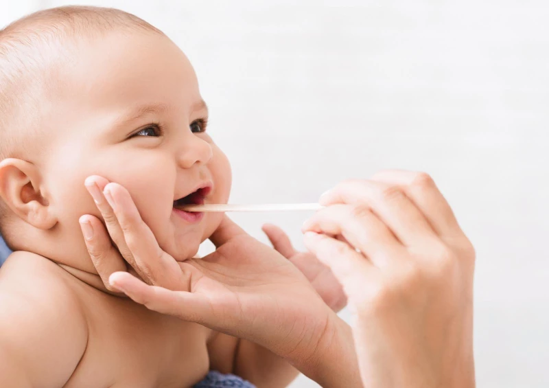 Baby with a lip tie. Lip tie treatment at The Dental Family in Westfield and Cranford, NJ.
